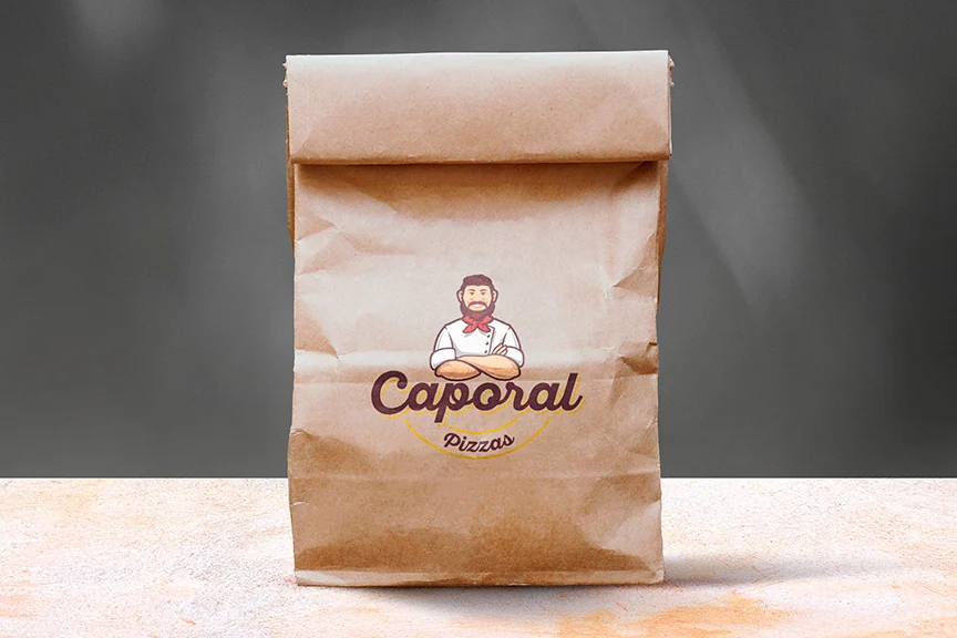Embalagem kraft para delivery com a marca Caporal Pizzas